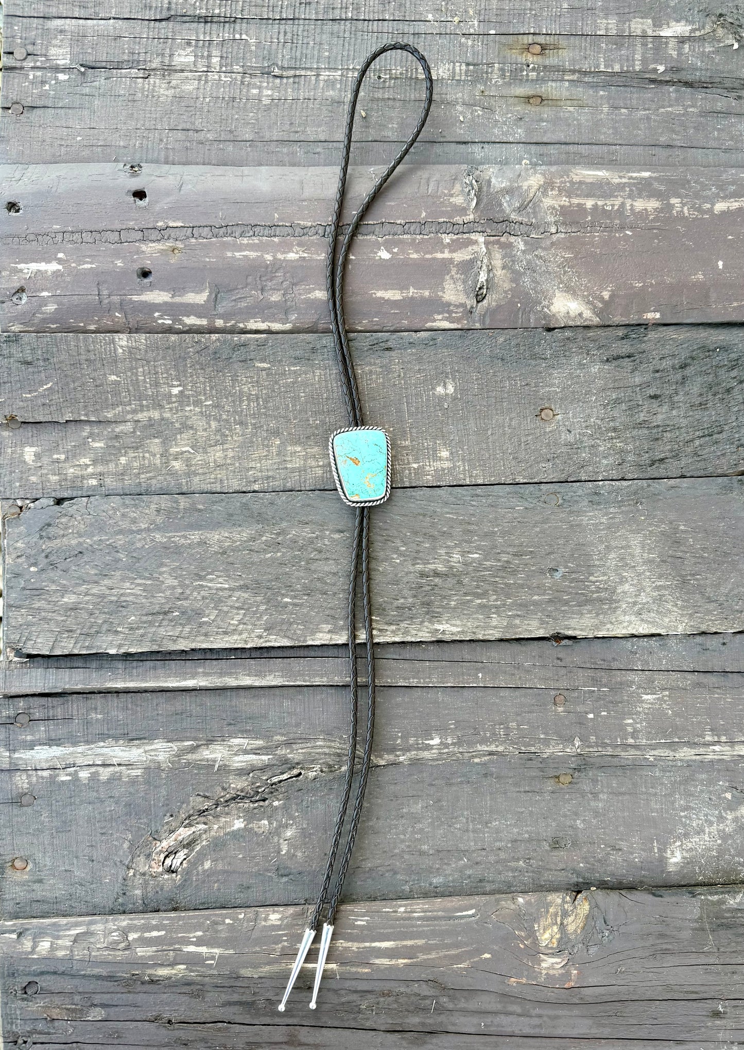 Royston Montezuma Turquoise Bolo Tie with Dark Brown Leather Cord