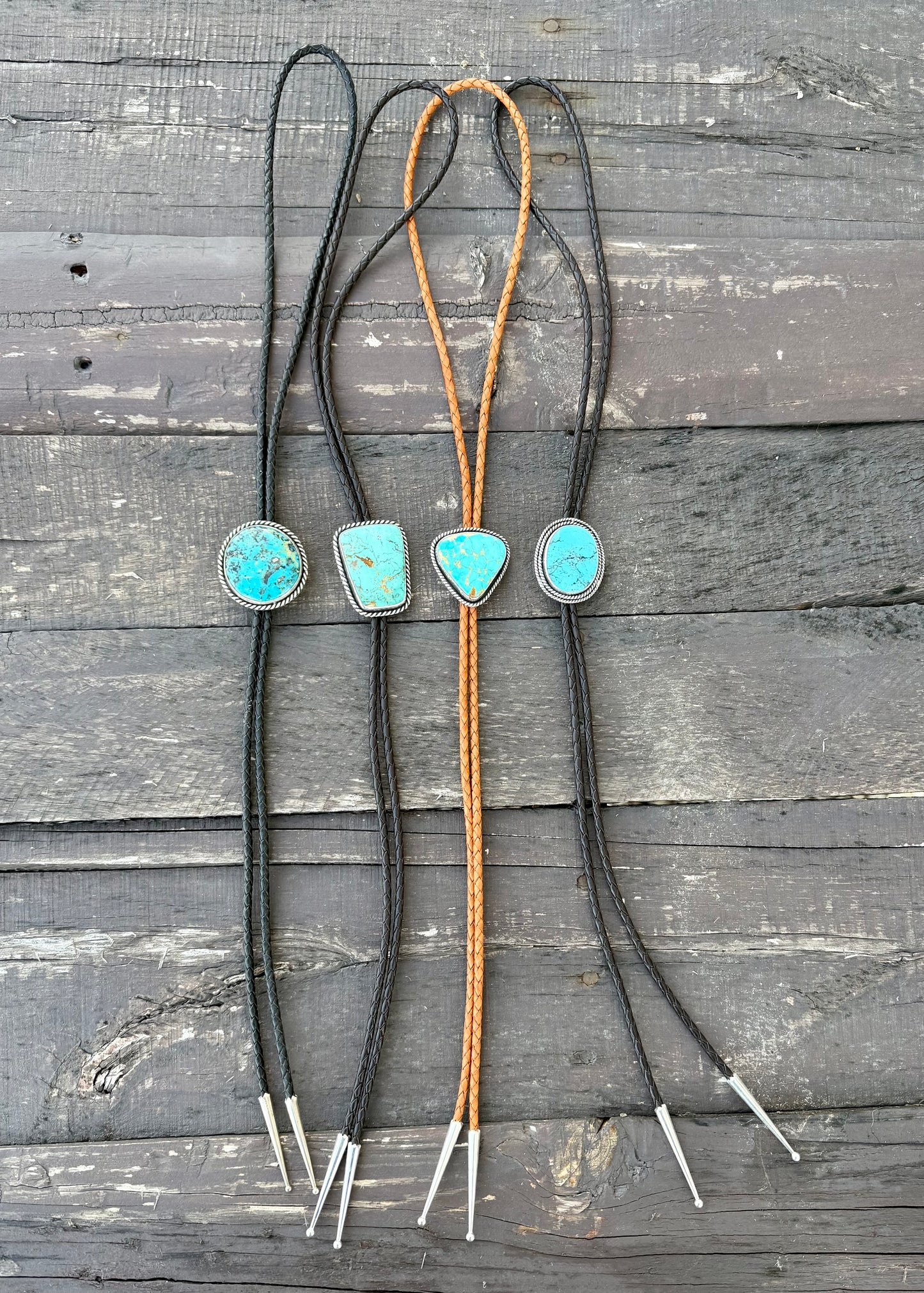 Royston Montezuma Turquoise Bolo Tie with Dark Brown Leather Cord